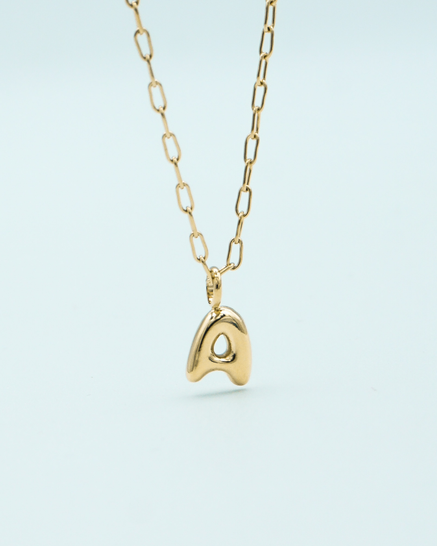 Tiny Puffed Up Letter Charm Gold